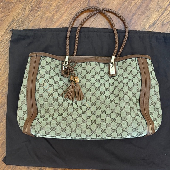 Gucci Handbags - Gucci Medium GG Bella Canvas Tote with Tassel Charm